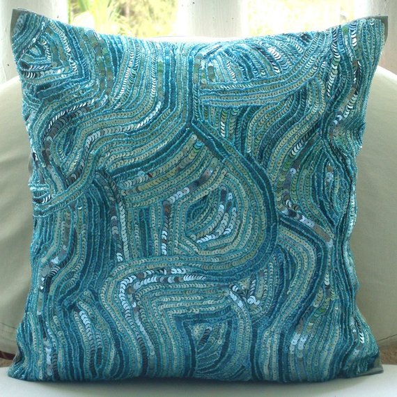 https://www.thehomecentric.com/cdn/shop/products/aqua-infinity-blue-silk-sea-creatures-beach-style-waves-sequins-embellished-designer-pillow-covers_1024x1024.jpg?v=1573238590
